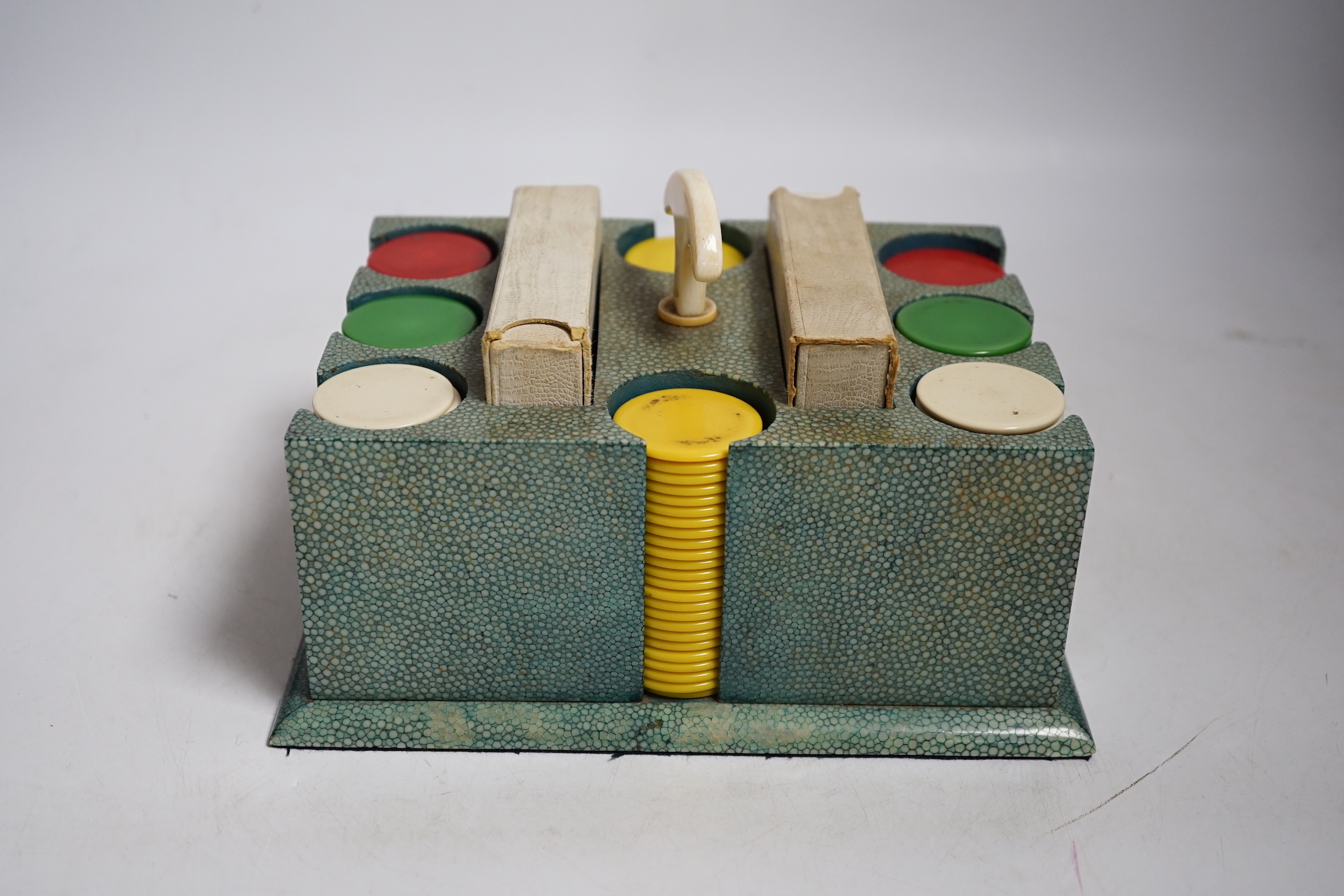 An Art Deco shagreen poker gaming set, ivory mounted with bakelite counters and two card packs by Goodall, London., CITES Submission reference 5SWXP1K4